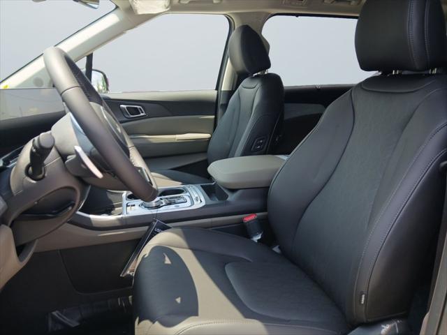 Photo of 2026 Aurora Blue Kia Carnival Hybrid