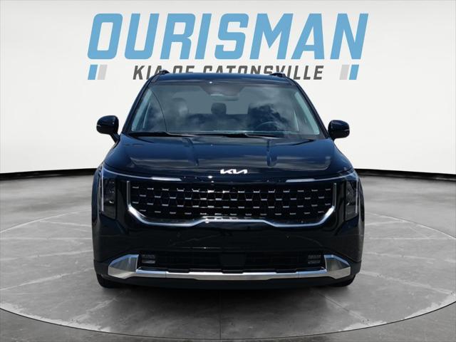 Photo of 2026 Aurora Blue Kia Carnival Hybrid
