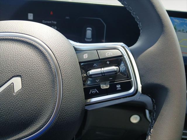 Photo of 2026 Aurora Blue Kia Carnival Hybrid