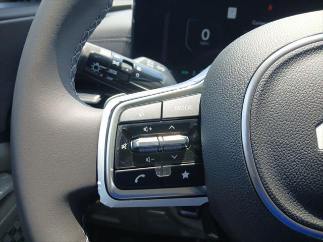 Photo of 2026 Aurora Blue Kia Carnival Hybrid