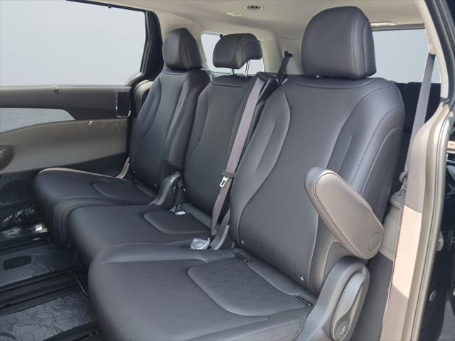 Photo of 2026 Aurora Blue Kia Carnival Hybrid
