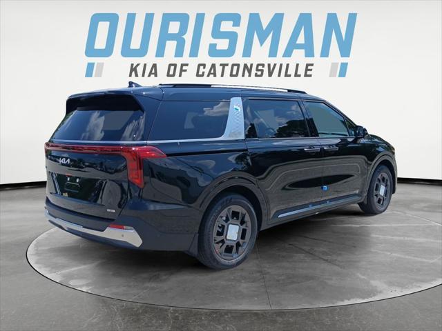Photo of 2026 Aurora Blue Kia Carnival Hybrid