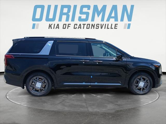 Photo of 2026 Aurora Blue Kia Carnival Hybrid