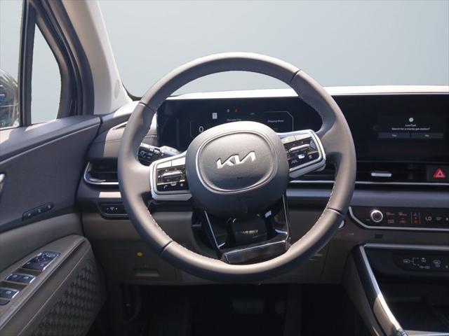 Photo of 2026 Aurora Blue Kia Carnival Hybrid