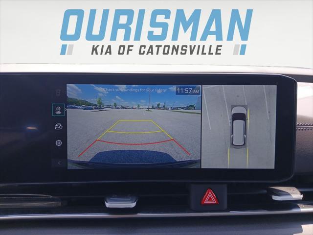 Photo of 2026 Aurora Blue Kia Carnival Hybrid