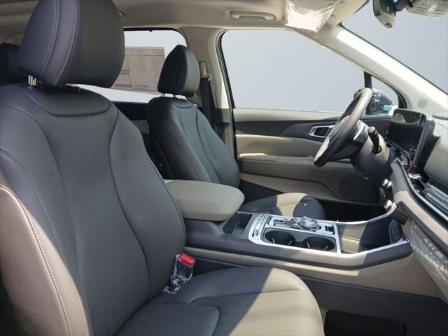 Photo of 2026 Aurora Blue Kia Carnival Hybrid