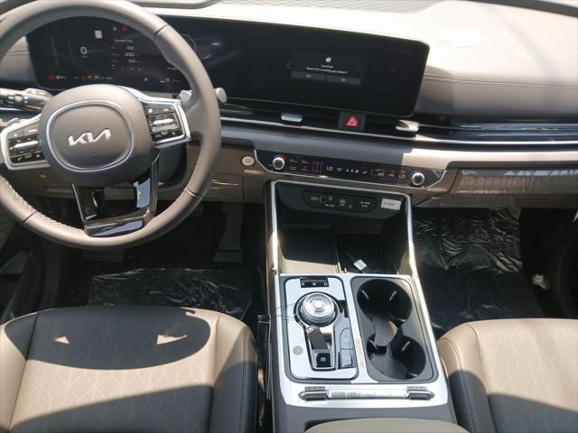 Photo of 2026 Aurora Blue Kia Carnival Hybrid