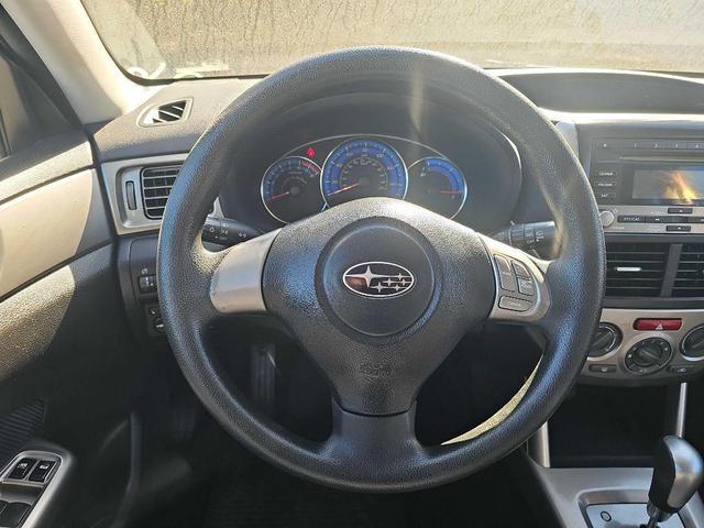Photo of 2009 Camellia Red Pearl Subaru Forester