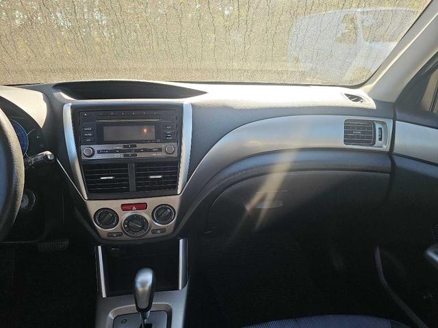 Photo of 2009 Camellia Red Pearl Subaru Forester