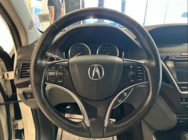 Photo of 2015 White Acura MDX