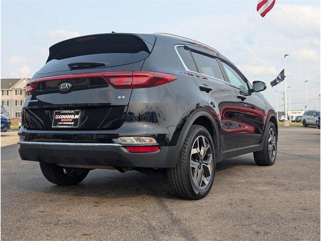 Photo of 2021 Black Cherry Kia Sportage