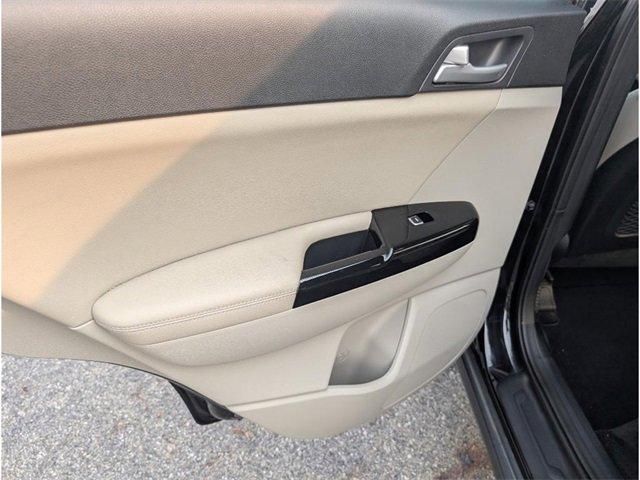 Photo of 2021 Black Cherry Kia Sportage