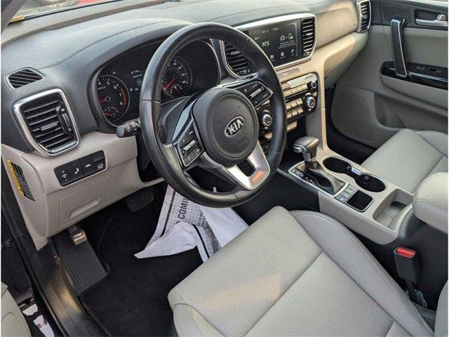 Photo of 2021 Black Cherry Kia Sportage