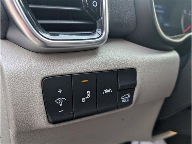 Photo of 2021 Black Cherry Kia Sportage