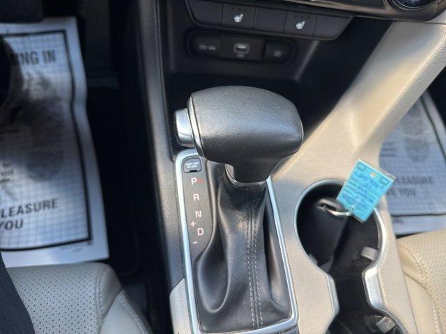 Photo of 2021 Black Cherry Kia Sportage
