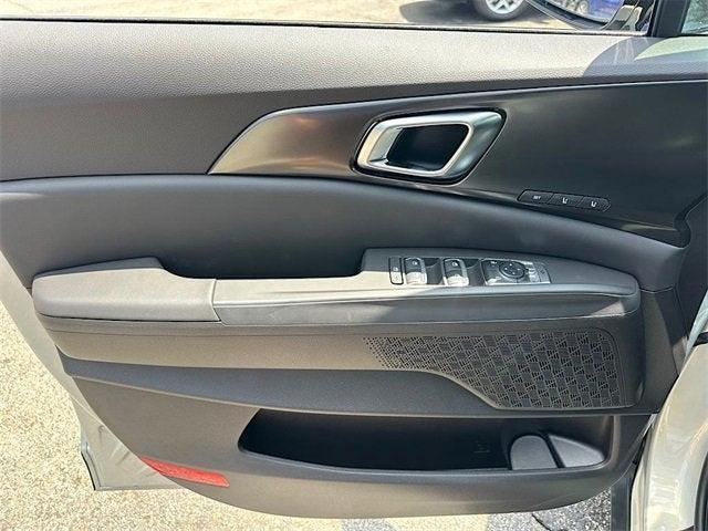 Photo of 2026 Ivory Silver Kia Carnival Hybrid
