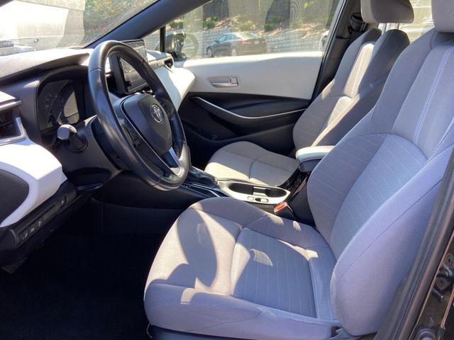 Photo of 2023 Midnight Black Metallic Toyota Corolla Hybrid