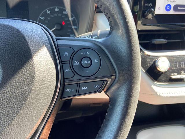 Photo of 2023 Midnight Black Metallic Toyota Corolla Hybrid
