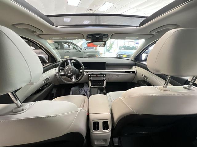 Photo of 2025 Creamy White Pearl Hyundai TUCSON Plug-In Hybrid