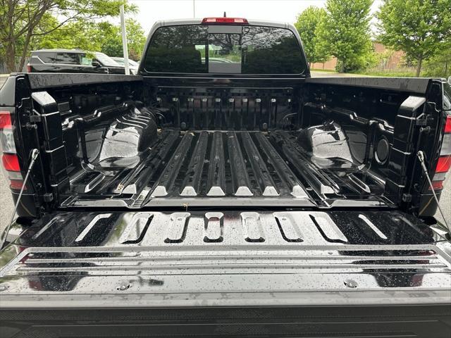 Photo of 2025 Super Black Nissan Frontier