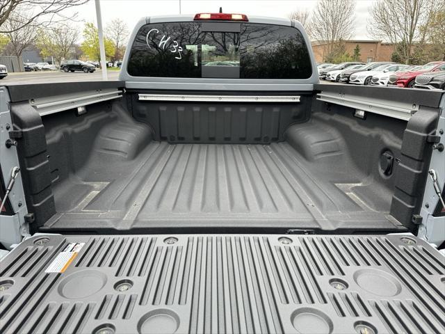 Photo of 2025 Boulder Gray Pearl Nissan Frontier