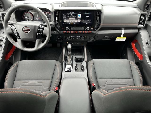 Photo of 2025 Boulder Gray Pearl Nissan Frontier