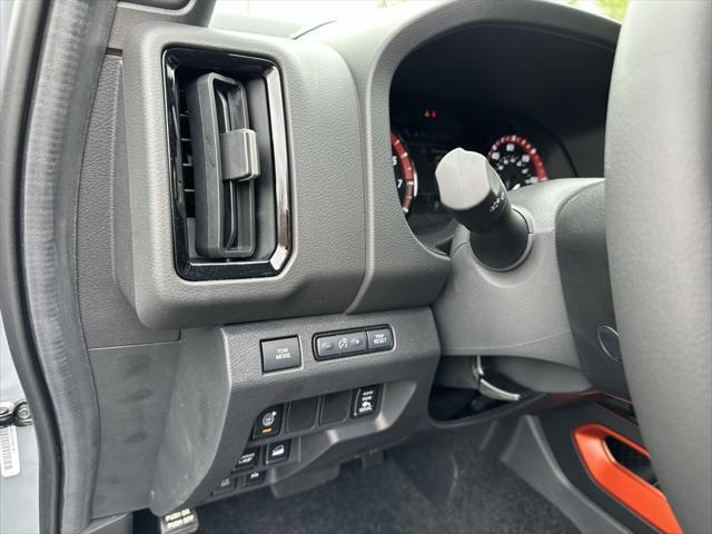 Photo of 2025 Boulder Gray Pearl Nissan Frontier