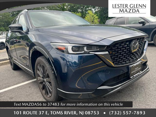 Photo of 2023 Deep Crystal Blue Mica Mazda CX-5