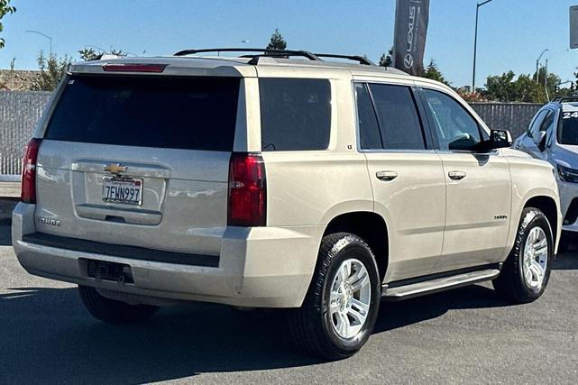 Photo of 2015 Champagne Silver Metallic Chevrolet Tahoe