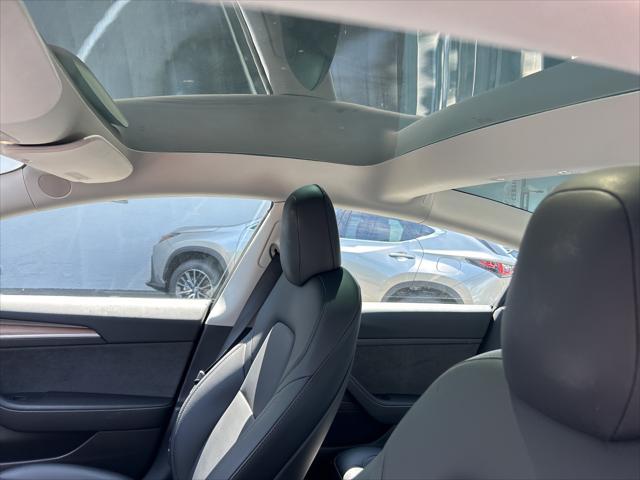 Photo of 2022 Midnight Silver Metallic Tesla Model 3
