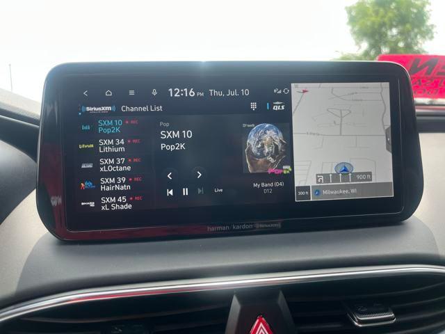 Photo of 2023 Calypso Red Hyundai SANTA FE
