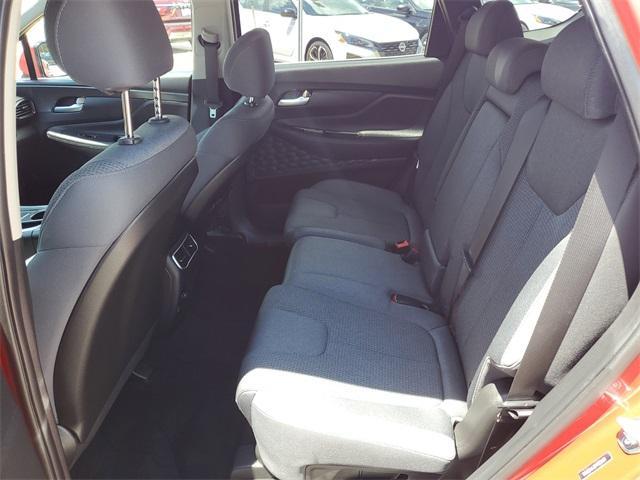 Photo of 2023 Calypso Red Hyundai SANTA FE