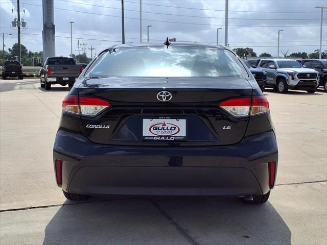 Photo of 2023 Midnight Black Metallic Toyota Corolla