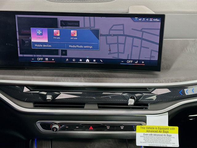 Photo of 2024 Mineral White Metallic BMW X5