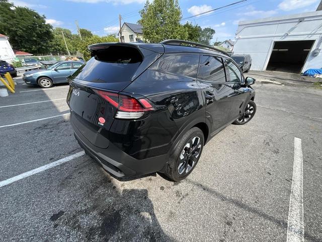 Photo of 2023 Ebony Black Kia Sportage