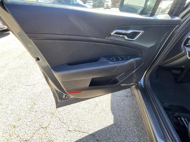 Photo of 2023 Gravity Gray Kia Sportage Hybrid