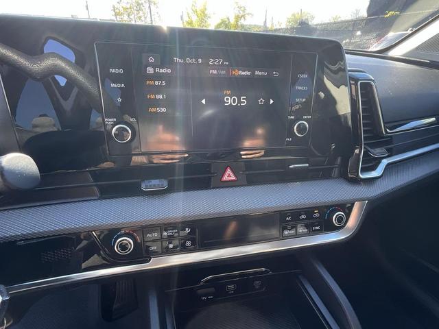 Photo of 2023 Gravity Gray Kia Sportage Hybrid