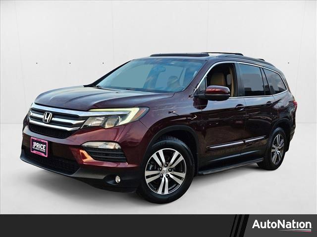 Photo of 2016 Dark Cherry Pearl Honda Pilot