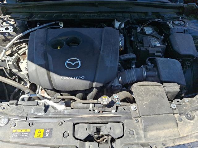 Photo of 2024 Ingot Blue Metallic Mazda CX-50