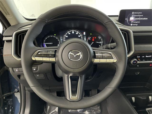 Photo of 2025 Ingot Blue Metallic Mazda CX-50 Hybrid