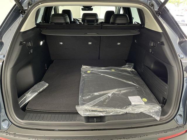 Photo of 2025 Ingot Blue Metallic Mazda CX-50 Hybrid