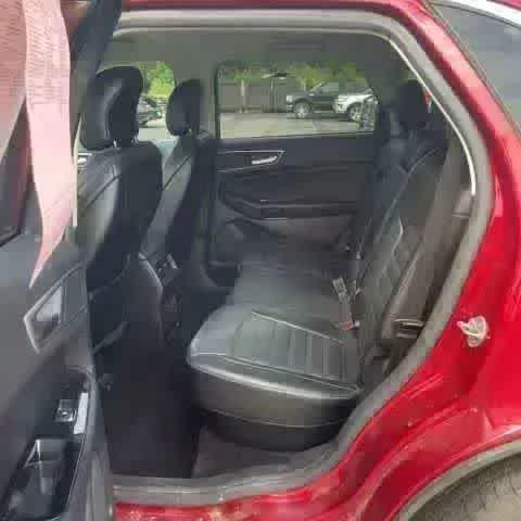 Photo of 2016 Ruby Red Metallic Tinted Clearcoat Ford Edge