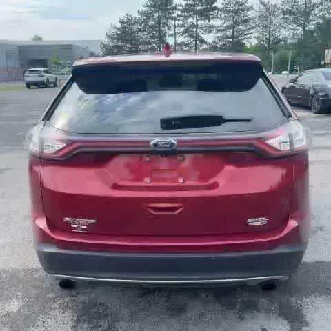 Photo of 2016 Ruby Red Metallic Tinted Clearcoat Ford Edge