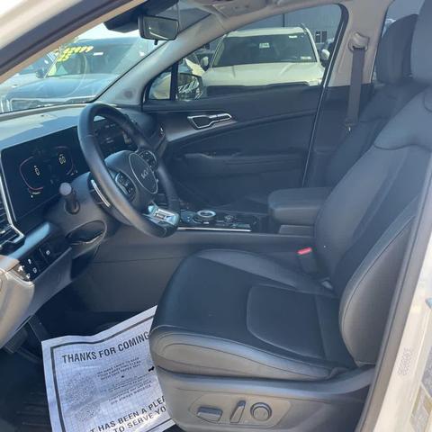 Photo of 2024 Snow White Pearl Kia Sportage Hybrid