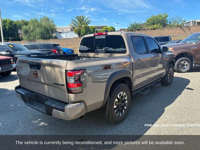 Photo of 2024 Beige / Tan Nissan Frontier
