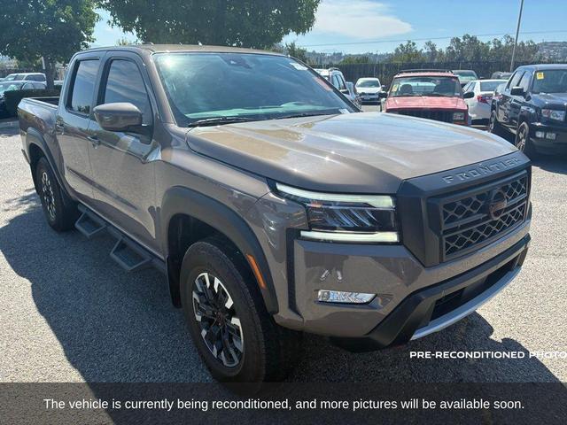 Photo of 2024 Beige / Tan Nissan Frontier