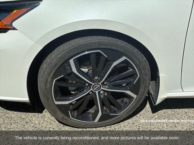 Photo of 2024 Pearl White Tricoat Nissan Altima