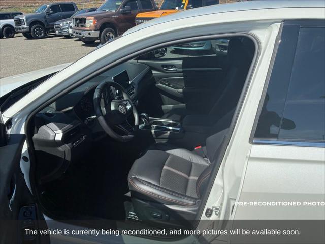 Photo of 2024 Pearl White Tricoat Nissan Altima