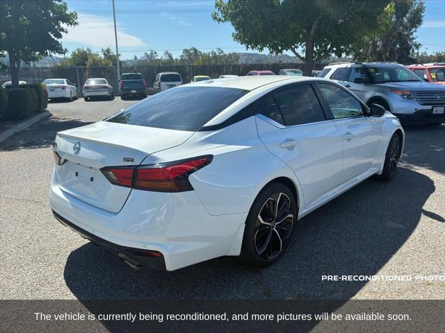 Photo of 2024 Pearl White Tricoat Nissan Altima