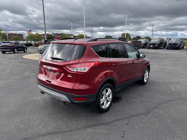 Photo of 2016 Ruby Red Metallic Ford Escape